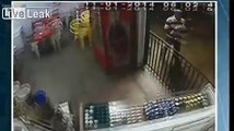 Man needs both legs partly amputated after being hit by falling, concrete shop facade
