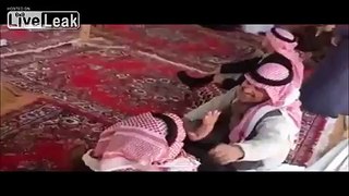 LiveLeak.com - Saudi kid showing the guests his dad's gift