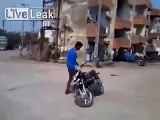 Cows chase off Biker