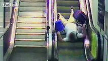 LiveLeak.com - CCTV of trip ups on escalators in railway stations