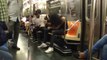 Man does crazy Air Drum performance in Subway with headbanging... Rock'n Roll!