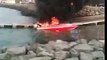 LiveLeak.com - Kuwaiti guys use their jet-skies to put out boat fire