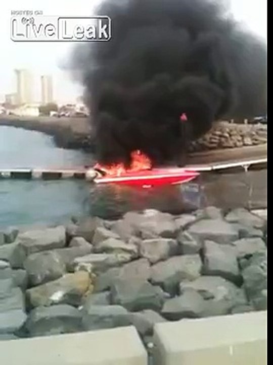 LiveLeak.com - Kuwaiti guys use their jet-skies to put out boat fire