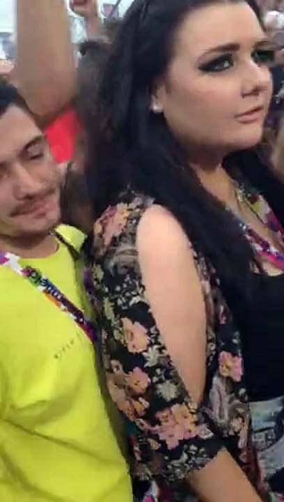 Girl is in the middle of the wall of death and doesn t realize! Moshpit FAIL
