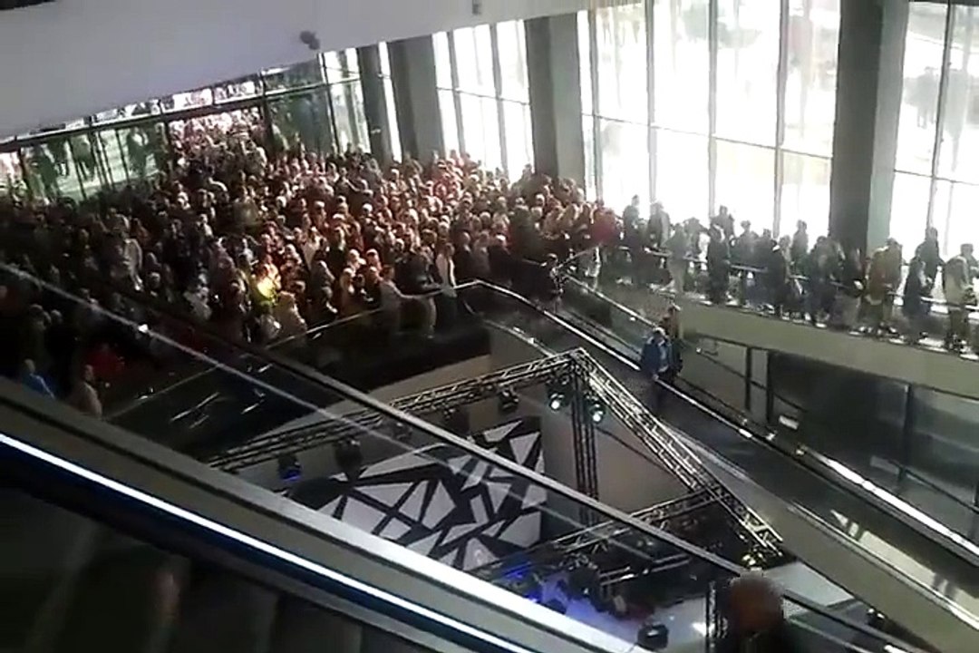 Two Old Men try to walk in wrong way escalator just for a free burger