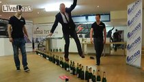 LiveLeak.com - Can You Walk On Bottles or Catch Darts With Your Hands?