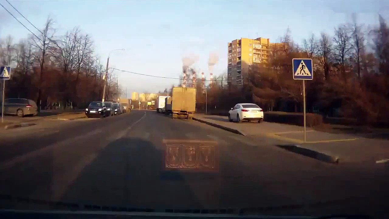 The bus stopped a truck