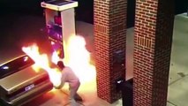 Stupid guy puts Spider on Fire in Gas Station...