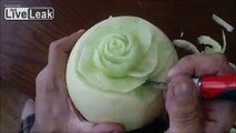 Carving a honeydew melon into a flower