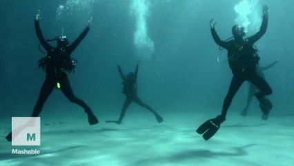Dancers-turned-divers put on majestic underwater performance