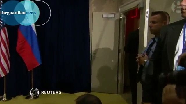 Barack Obama and Vladimir Putin shake hands for the cameras - UN Summit