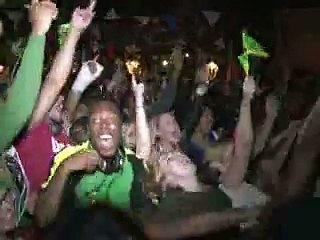 A Londres, un salon de coiffure jamaïcain, fan-club de Bolt