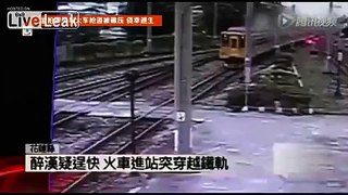 Drunk man only gets some bruises after hitting moving train
