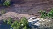 Huge Sinkhole Swallows Car and Caravan on Australian Beach