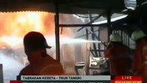 LiveLeak.com - Indonesia Train Crash `VIDEO Commuter train bursts into Flames after collision with Truck