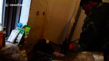 Firemen rescue near-naked man trapped inside chimney