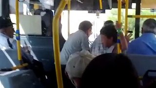 Two Arab kids harassing passengers on a bus till being kicked out by force