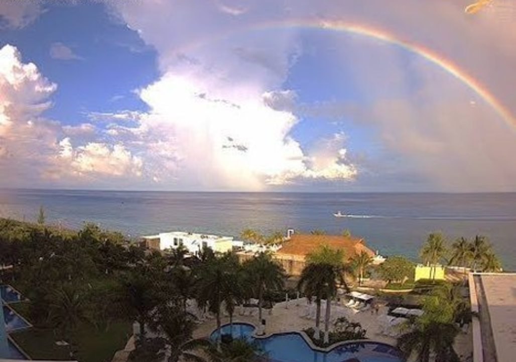 Spectacular Rainbow Alights Skies Over Mexico's Cozumel Island