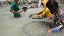 Miles de niños filipinos arriesgan su vida trabajando en minas ilegales de oro