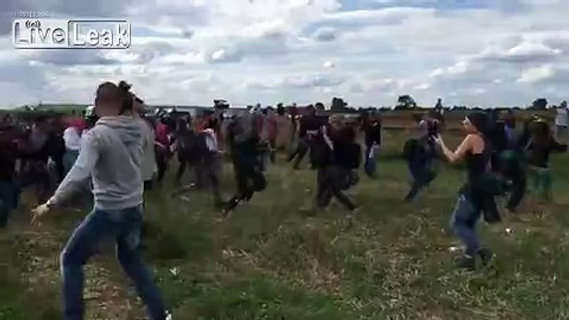 LiveLeak.com - TV reporter trip Syrian refugee in Hungary - Are we human?