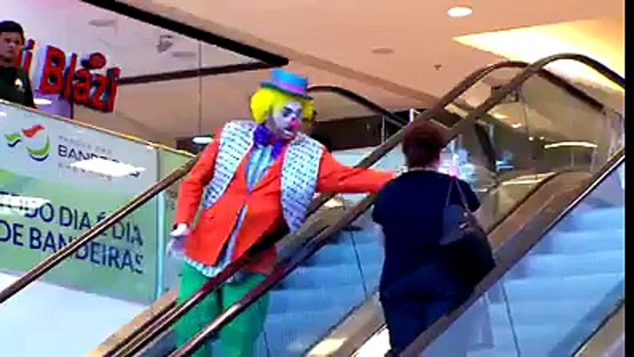 Funny Video: Woman Chases Clown Down An Escalator After Pie Slap