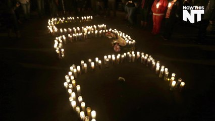 Scenes From Last Night's Candlelight Vigil At UCC