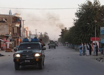Afghan officials say government retakes Kunduz; Taliban denies