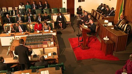 Cameron attends Jamaican parliament and lays wreath
