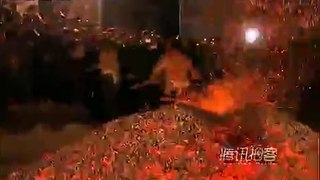 Villagers runs on burning charcoal to celebrate Chinese new year