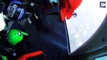 Skydivers Fly Like Superheros While Performing Loop De Loop