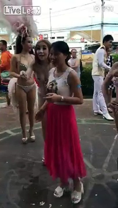 Lady boys pose to greet Chinese tourists to boost business