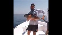 This fisherman has some problem to catch this tuna!!! Strong fish