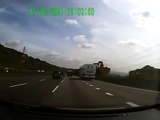 Accident on highway. Car loses control of the truck crash