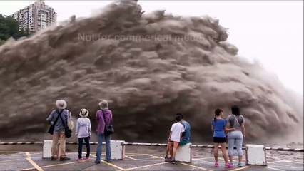 Taiwan Flood waters jet out of Shihmen Dam after deluge of Dujuan Typhoon