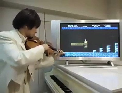Un violoniste accompagne Super Mario en live sur une partie