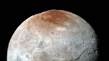 New photos of Pluto's moon covered in mountains and canyons