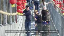 China's First Glass Bottomed Nearly 600-Foot High Suspension Bridge