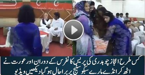 A Women Pelting Eggs On Ejaz Chaudhary (PTI) During Press Conference