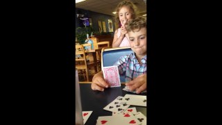 Boy can't believe his dad can magically guess his cards
