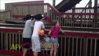 Girl Gets Knocked Over By Huge Wave at Amusement Park