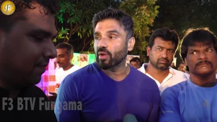 "SUNIL SHETTY" DOES THE FLAG OFF OF KALINA MARATHAN