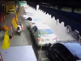 CCTV Footage of car crashing in parked cars