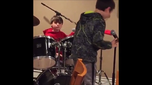 That's the BEST fall ever - Kid falling while drummer is laughing at him!