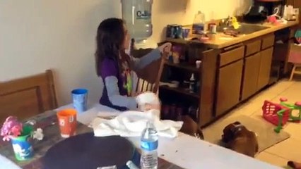 Girl tricks dad with water bottle prank