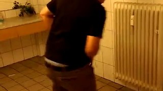 Drunk Guy Knocks Himself Out inside the Restroom