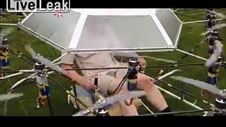 LiveLeak.com - Watch inventor take off in drone helicopter fashioned from garden chair and parasol