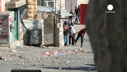 Israeli police and Palestinians clash after stabbing attacks