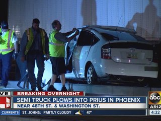 Semi and car collide on light rail tracks