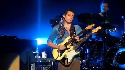 John Mayer takes guitar from fan mid-solo and finishes with it