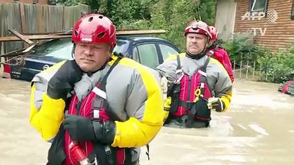 Скачать видео: Etats-Unis: 11 morts dans les inondations en Caroline du Sud